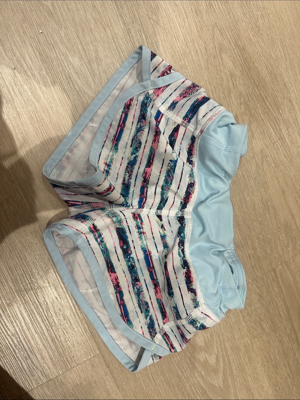 Ivivva Light Blue Shorts with Pink and Teal Stripe Accents